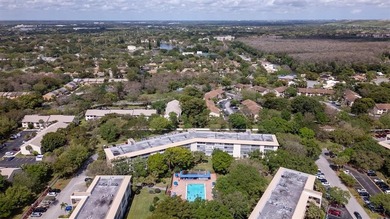 Stunning turn key furnished  2/2 Corner Unit in Wynmoor's on Wynmoor Golf Course in Florida - for sale on GolfHomes.com, golf home, golf lot