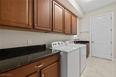 This stunning home located in Pelican Preserve with a coveted on Pelican Preserve Golf Club in Florida - for sale on GolfHomes.com, golf home, golf lot