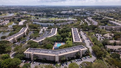 Stunning turn key furnished  2/2 Corner Unit in Wynmoor's on Wynmoor Golf Course in Florida - for sale on GolfHomes.com, golf home, golf lot