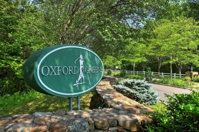 Welcome to 220 Chip Shot Lane, located in the desirable Village on The Golf Club At Oxford Greens in Connecticut - for sale on GolfHomes.com, golf home, golf lot