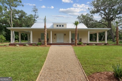 Experience luxury living at its finest in this stunning on The Golf Club At Sanctuary Cove in Georgia - for sale on GolfHomes.com, golf home, golf lot