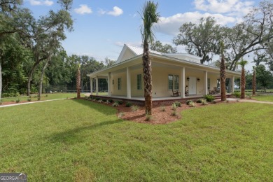 Experience luxury living at its finest in this stunning on The Golf Club At Sanctuary Cove in Georgia - for sale on GolfHomes.com, golf home, golf lot