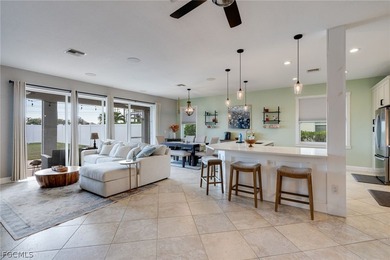 Beautifully updated single-family home located in the gated on Gateway Golf and Country Club in Florida - for sale on GolfHomes.com, golf home, golf lot