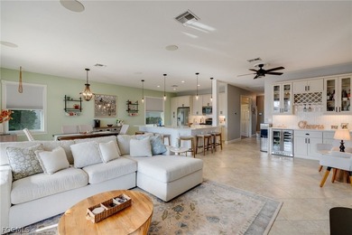 Beautifully updated single-family home located in the gated on Gateway Golf and Country Club in Florida - for sale on GolfHomes.com, golf home, golf lot