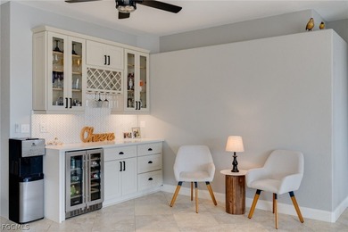 Beautifully updated single-family home located in the gated on Gateway Golf and Country Club in Florida - for sale on GolfHomes.com, golf home, golf lot