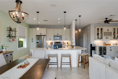 Beautifully updated single-family home located in the gated on Gateway Golf and Country Club in Florida - for sale on GolfHomes.com, golf home, golf lot