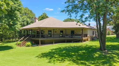 This stunning home offers timeless craftsmanship, luxurious on The Coves Golf Course in Oklahoma - for sale on GolfHomes.com, golf home, golf lot