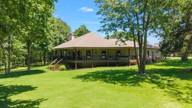 This stunning home offers timeless craftsmanship, luxurious on The Coves Golf Course in Oklahoma - for sale on GolfHomes.com, golf home, golf lot
