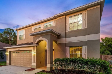 SCENIC. SPACIOUS. SERENEe visit this 4-bedroom, 2.5-bath home on on Meadow Oaks Golf and Country Club in Florida - for sale on GolfHomes.com, golf home, golf lot