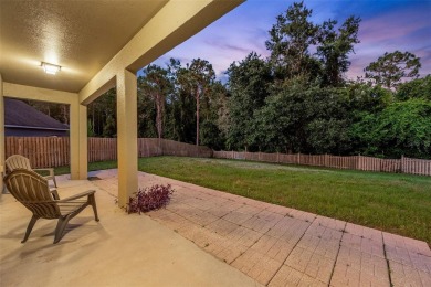 SCENIC. SPACIOUS. SERENEe visit this 4-bedroom, 2.5-bath home on on Meadow Oaks Golf and Country Club in Florida - for sale on GolfHomes.com, golf home, golf lot