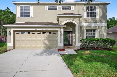 SCENIC. SPACIOUS. SERENEe visit this 4-bedroom, 2.5-bath home on on Meadow Oaks Golf and Country Club in Florida - for sale on GolfHomes.com, golf home, golf lot