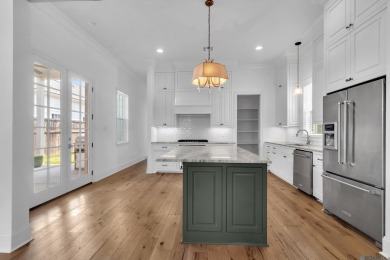 Discover a home that truly has it all! This stunning 3-bedroom on University Club in Louisiana - for sale on GolfHomes.com, golf home, golf lot