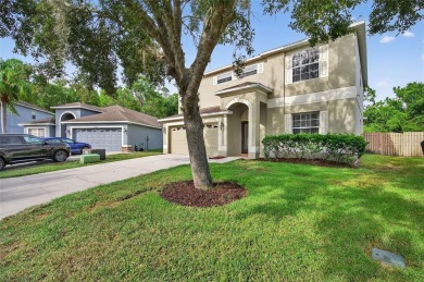 SCENIC. SPACIOUS. SERENEe visit this 4-bedroom, 2.5-bath home on on Meadow Oaks Golf and Country Club in Florida - for sale on GolfHomes.com, golf home, golf lot