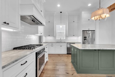 Discover a home that truly has it all! This stunning 3-bedroom on University Club in Louisiana - for sale on GolfHomes.com, golf home, golf lot