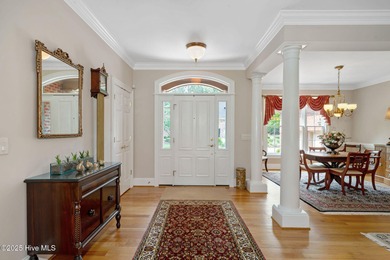 This custom-built home by renowned builder Johnny Stone offers on River Landing Golf Course in North Carolina - for sale on GolfHomes.com, golf home, golf lot