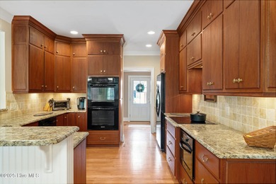 This custom-built home by renowned builder Johnny Stone offers on River Landing Golf Course in North Carolina - for sale on GolfHomes.com, golf home, golf lot