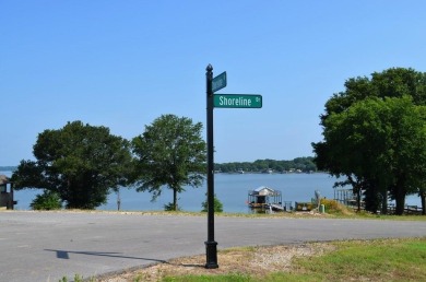 Beautiful sunsets and open water views from this corner lot on Cedar Creek Country Club in Texas - for sale on GolfHomes.com, golf home, golf lot