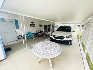 This home is located in a 55+ community in the back of the park on Lone Palm Golf Club in Florida - for sale on GolfHomes.com, golf home, golf lot