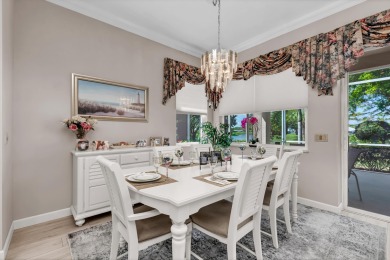 Enjoy breathtaking lake and golf course views from this on Monarch Country Club in Florida - for sale on GolfHomes.com, golf home, golf lot