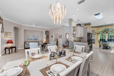 Enjoy breathtaking lake and golf course views from this on Monarch Country Club in Florida - for sale on GolfHomes.com, golf home, golf lot