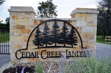 Beautiful sunsets and open water views from this corner lot on Cedar Creek Country Club in Texas - for sale on GolfHomes.com, golf home, golf lot