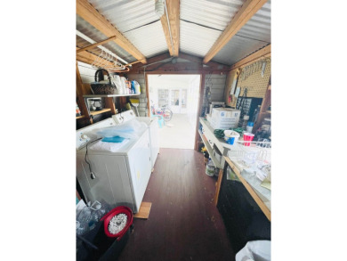 This home is located in a 55+ community in the back of the park on Lone Palm Golf Club in Florida - for sale on GolfHomes.com, golf home, golf lot