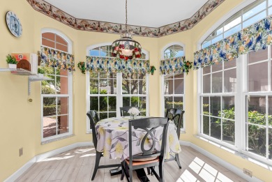 Enjoy breathtaking lake and golf course views from this on Monarch Country Club in Florida - for sale on GolfHomes.com, golf home, golf lot
