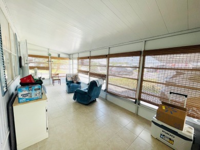 This home is located in a 55+ community in the back of the park on Lone Palm Golf Club in Florida - for sale on GolfHomes.com, golf home, golf lot