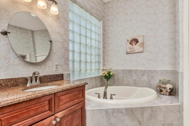 Enjoy breathtaking lake and golf course views from this on Monarch Country Club in Florida - for sale on GolfHomes.com, golf home, golf lot