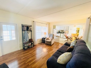 This home is located in a 55+ community in the back of the park on Lone Palm Golf Club in Florida - for sale on GolfHomes.com, golf home, golf lot