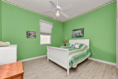 Enjoy breathtaking lake and golf course views from this on Monarch Country Club in Florida - for sale on GolfHomes.com, golf home, golf lot