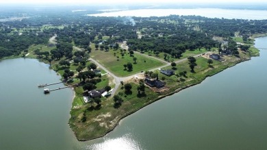 Beautiful sunsets and open water views from this corner lot on Cedar Creek Country Club in Texas - for sale on GolfHomes.com, golf home, golf lot