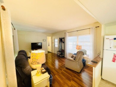This home is located in a 55+ community in the back of the park on Lone Palm Golf Club in Florida - for sale on GolfHomes.com, golf home, golf lot