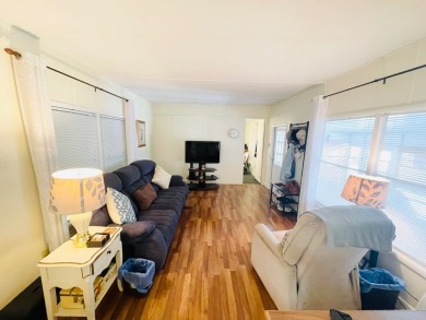 This home is located in a 55+ community in the back of the park on Lone Palm Golf Club in Florida - for sale on GolfHomes.com, golf home, golf lot