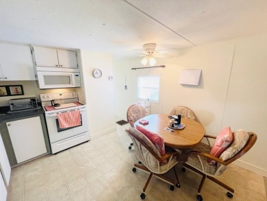 This home is located in a 55+ community in the back of the park on Lone Palm Golf Club in Florida - for sale on GolfHomes.com, golf home, golf lot