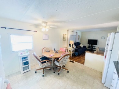 This home is located in a 55+ community in the back of the park on Lone Palm Golf Club in Florida - for sale on GolfHomes.com, golf home, golf lot