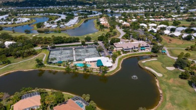 Enjoy breathtaking lake and golf course views from this on Monarch Country Club in Florida - for sale on GolfHomes.com, golf home, golf lot