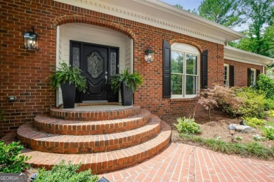 Welcome to this gorgeous three-sided brick European style ranch on Brookfield Country Club in Georgia - for sale on GolfHomes.com, golf home, golf lot