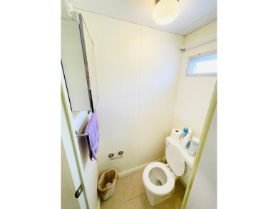 This home is located in a 55+ community in the back of the park on Lone Palm Golf Club in Florida - for sale on GolfHomes.com, golf home, golf lot