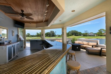 Enjoy breathtaking lake and golf course views from this on Monarch Country Club in Florida - for sale on GolfHomes.com, golf home, golf lot