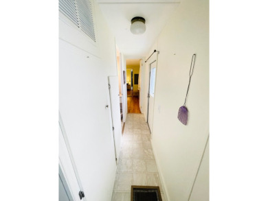 This home is located in a 55+ community in the back of the park on Lone Palm Golf Club in Florida - for sale on GolfHomes.com, golf home, golf lot