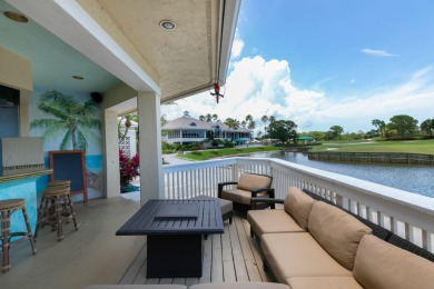 Enjoy breathtaking lake and golf course views from this on Monarch Country Club in Florida - for sale on GolfHomes.com, golf home, golf lot