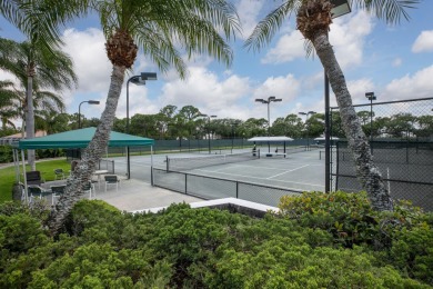 Enjoy breathtaking lake and golf course views from this on Monarch Country Club in Florida - for sale on GolfHomes.com, golf home, golf lot