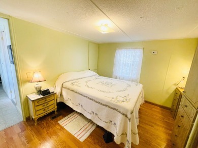 This home is located in a 55+ community in the back of the park on Lone Palm Golf Club in Florida - for sale on GolfHomes.com, golf home, golf lot
