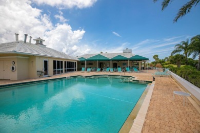 Enjoy breathtaking lake and golf course views from this on Monarch Country Club in Florida - for sale on GolfHomes.com, golf home, golf lot
