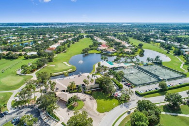 Enjoy breathtaking lake and golf course views from this on Monarch Country Club in Florida - for sale on GolfHomes.com, golf home, golf lot