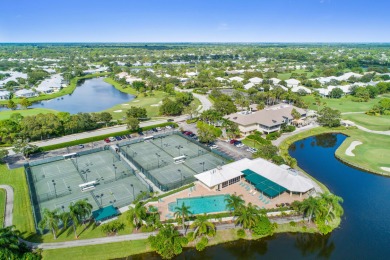 Enjoy breathtaking lake and golf course views from this on Monarch Country Club in Florida - for sale on GolfHomes.com, golf home, golf lot