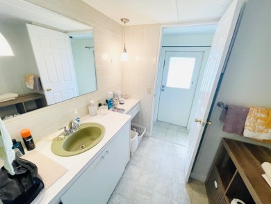 This home is located in a 55+ community in the back of the park on Lone Palm Golf Club in Florida - for sale on GolfHomes.com, golf home, golf lot
