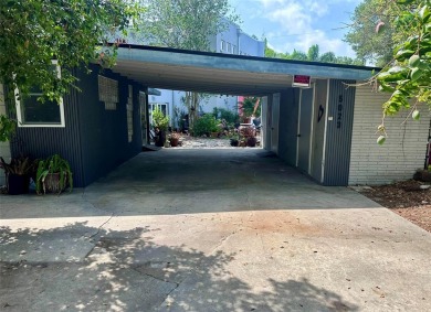 Just renovated 3 BR/2BA home, two car carport, with a two-story on Palm Aire Country Club of Sarasota in Florida - for sale on GolfHomes.com, golf home, golf lot