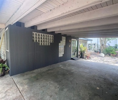 Just renovated 3 BR/2BA home, two car carport, with a two-story on Palm Aire Country Club of Sarasota in Florida - for sale on GolfHomes.com, golf home, golf lot